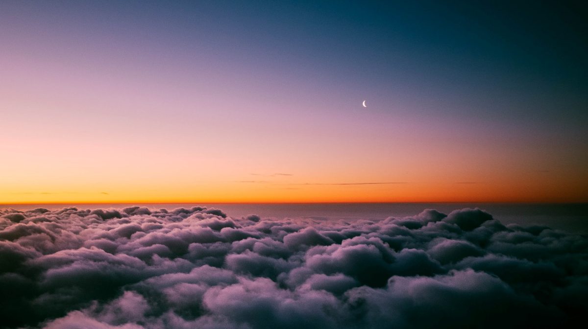 Sky from above the clouds at dusk
