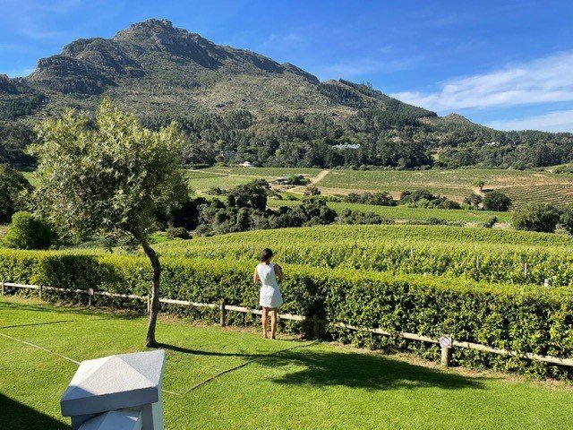 Photo of Rosie Gibson on a trip to a vineyard.