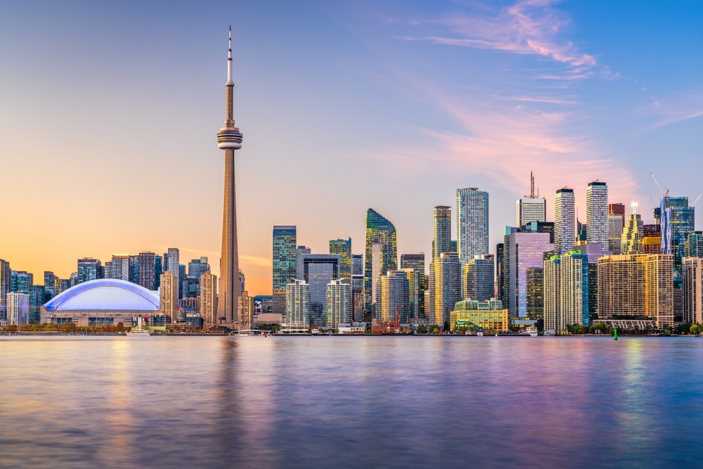 Toronto, Ontario, Canada cityscape on Lake Ontario at dusk.