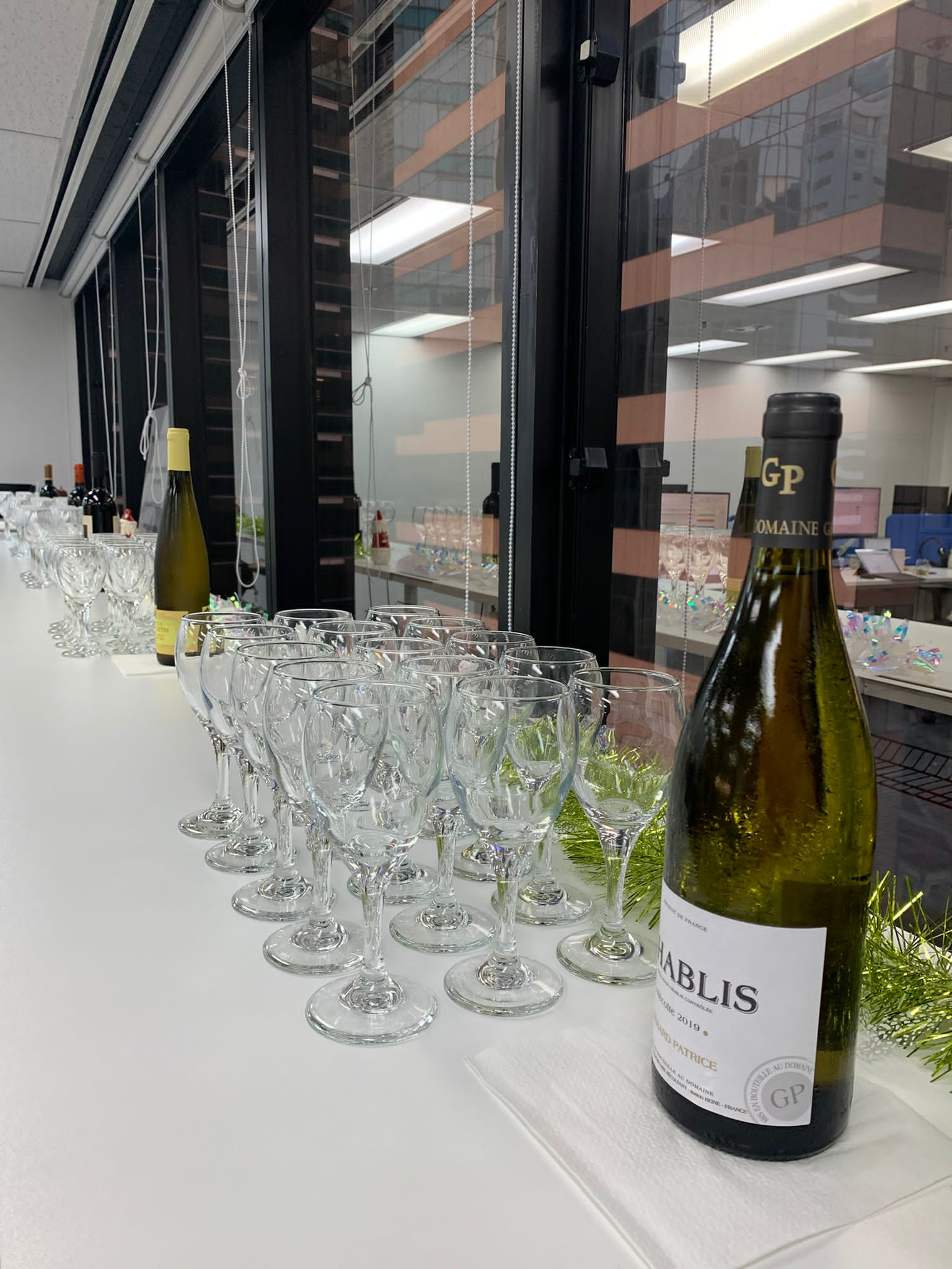 Image of wine bottle and glasses on a table