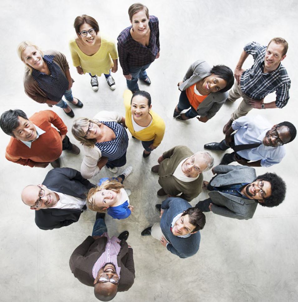 image of a group of multi-ethnic people looking up and smiling