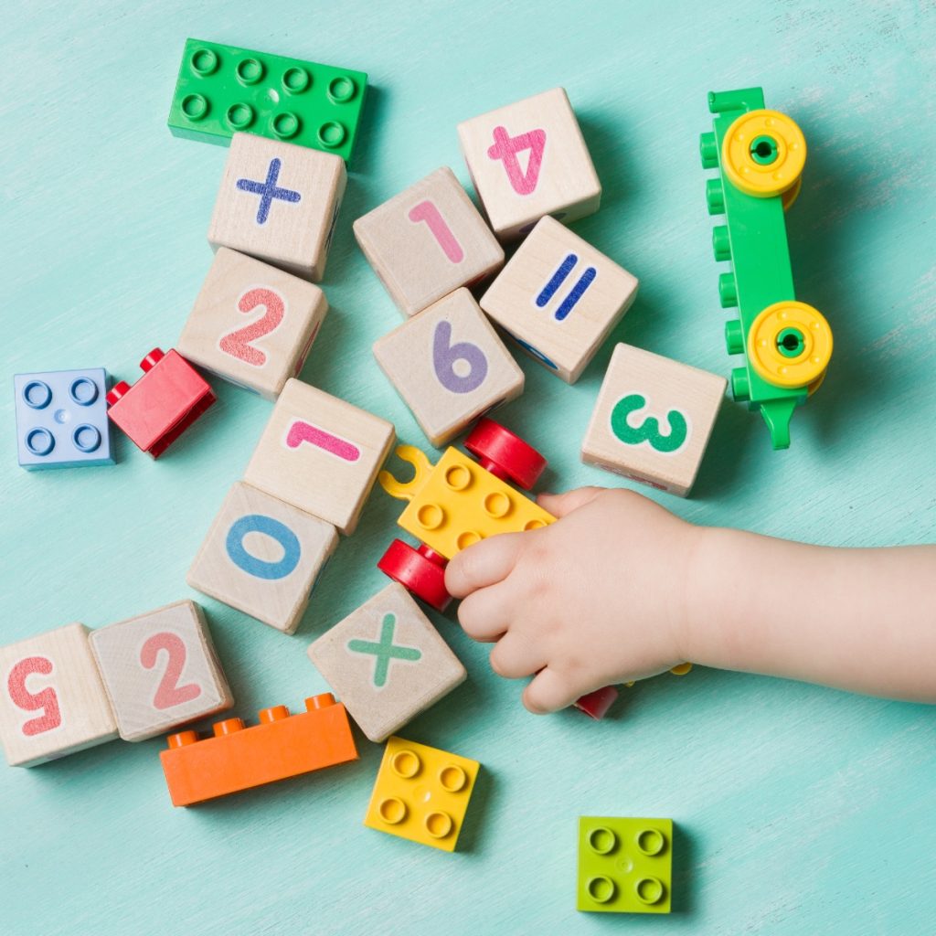 Child playing with lego