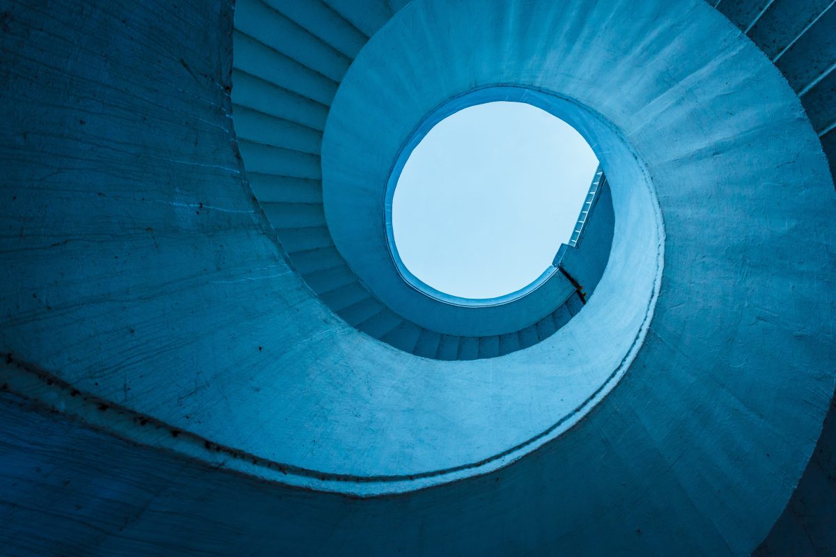 Abstract image of modern architecture with spiralling stairs