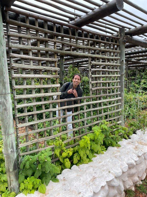 Photo of Rosie Gibson on a trip to a vineyard.