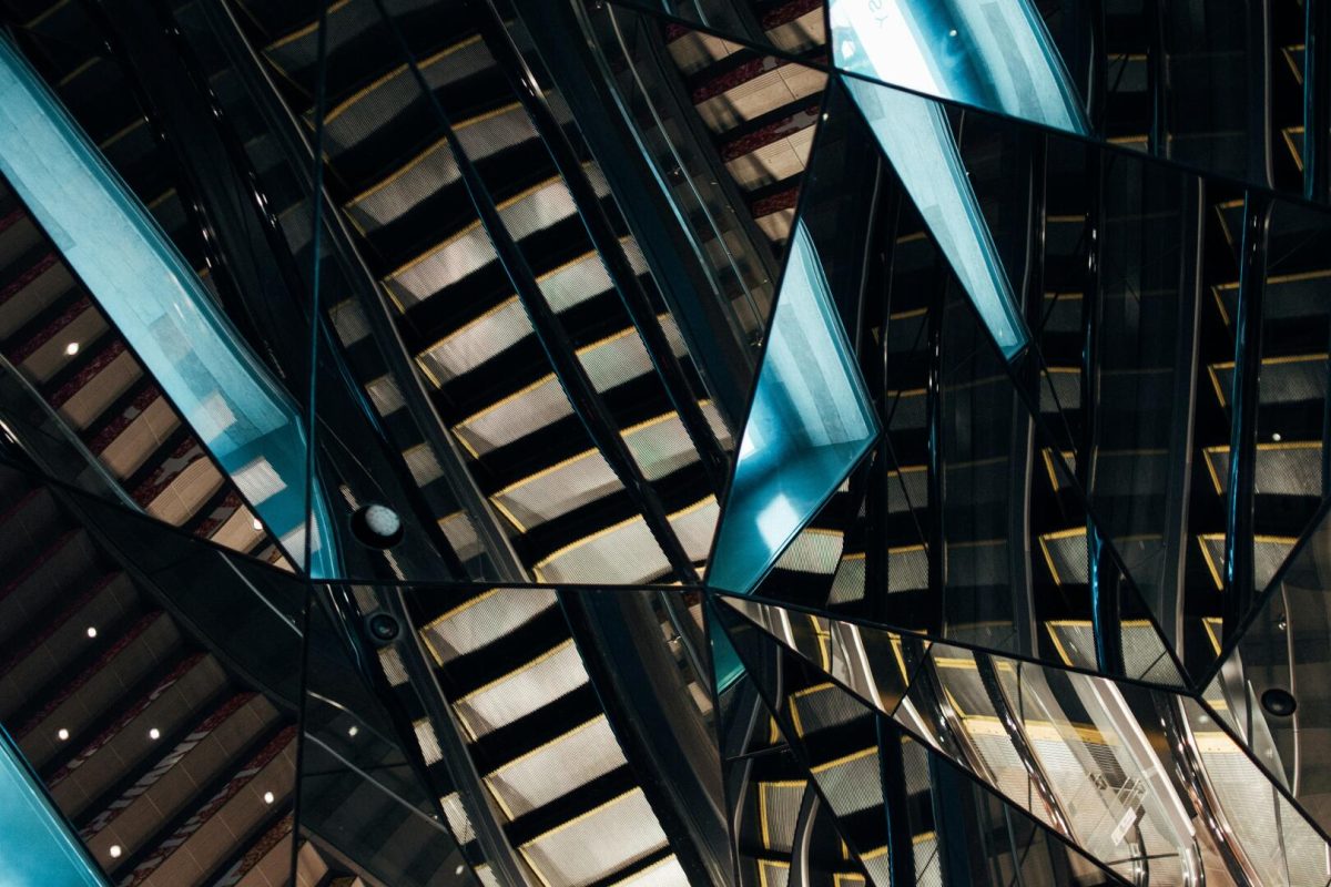 fractured mirror image reflecting city building