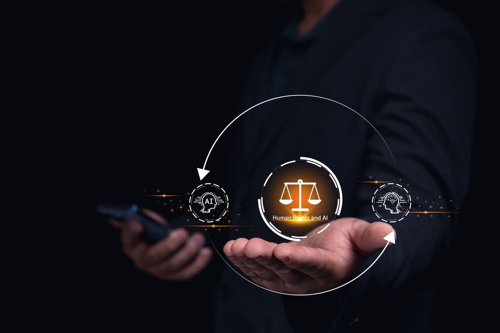 hand holding scales of justice