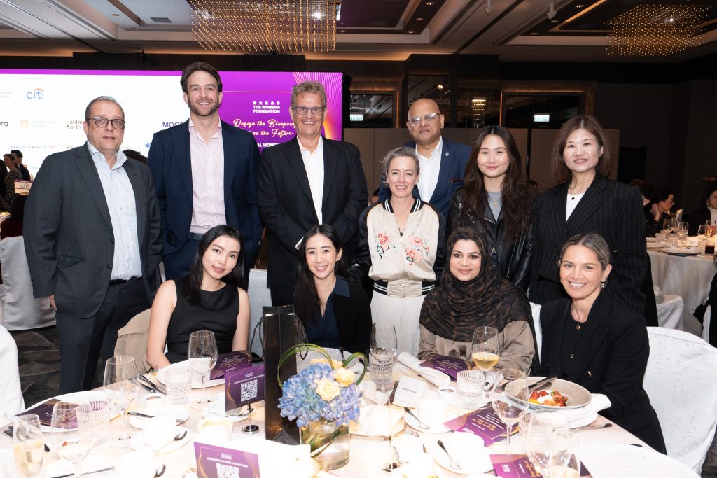 Leathwaite Hong Kong employees smiling for picture at international womens day lunch