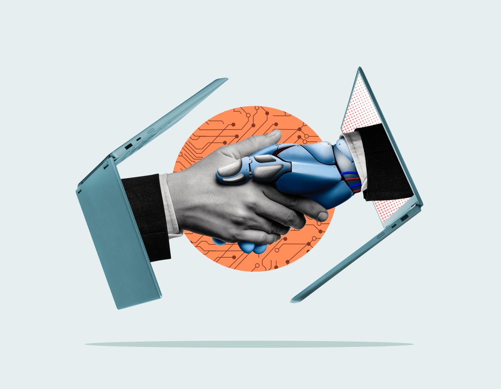Handshake of man with robot